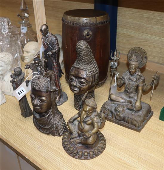 Two Benin style bronze heads, an African hardwood drum, two modern Maasai resin figures and two Indian bronze figures,